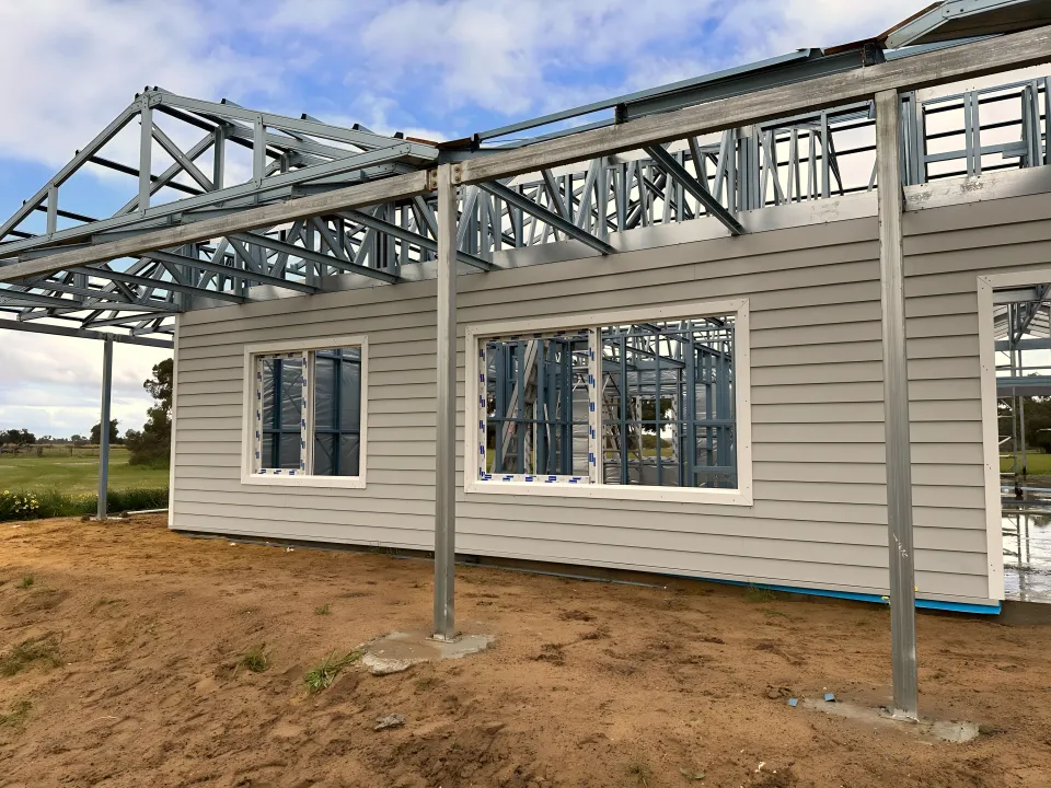 uPVC windows fitted to a steel-framed new build before cladding is complete