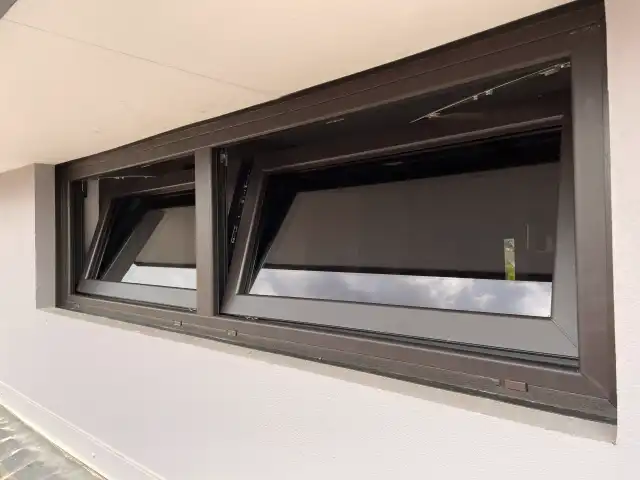Two timber-look tilt-only windows open side by side