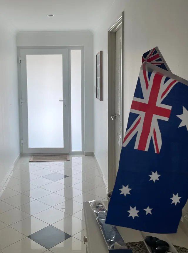 White uPVC entrance door in a bright new-build hallway